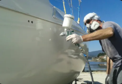 Detailed yacht hull and stainless fittings with mirror gloss finish